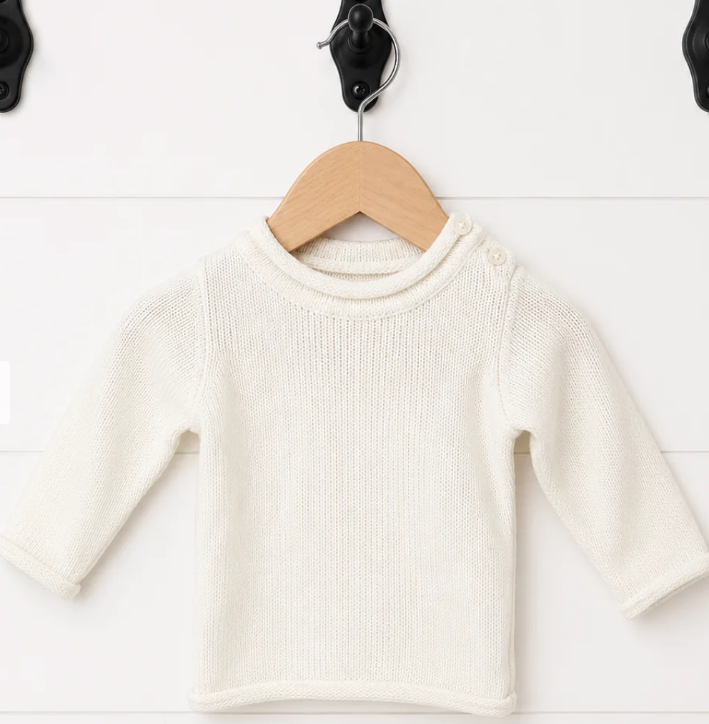 White personalized baby sweater with rolled neckline
