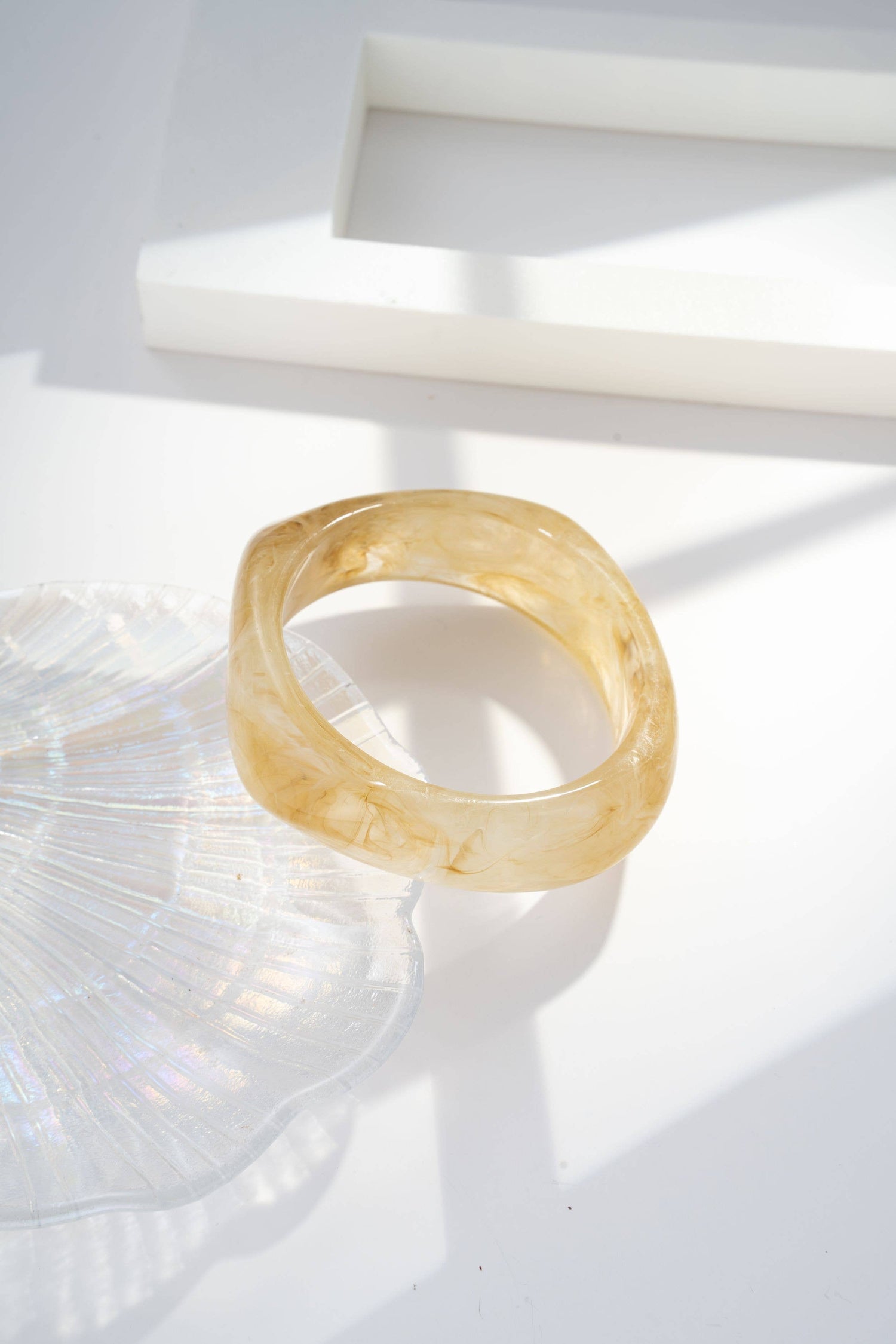 Marble-effect resin bangle bracelet