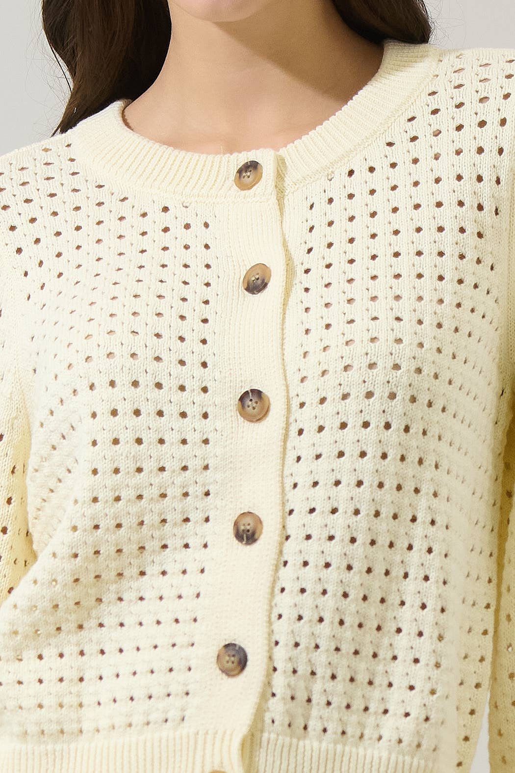Cream button-down knit cardigan with ribbed trim
