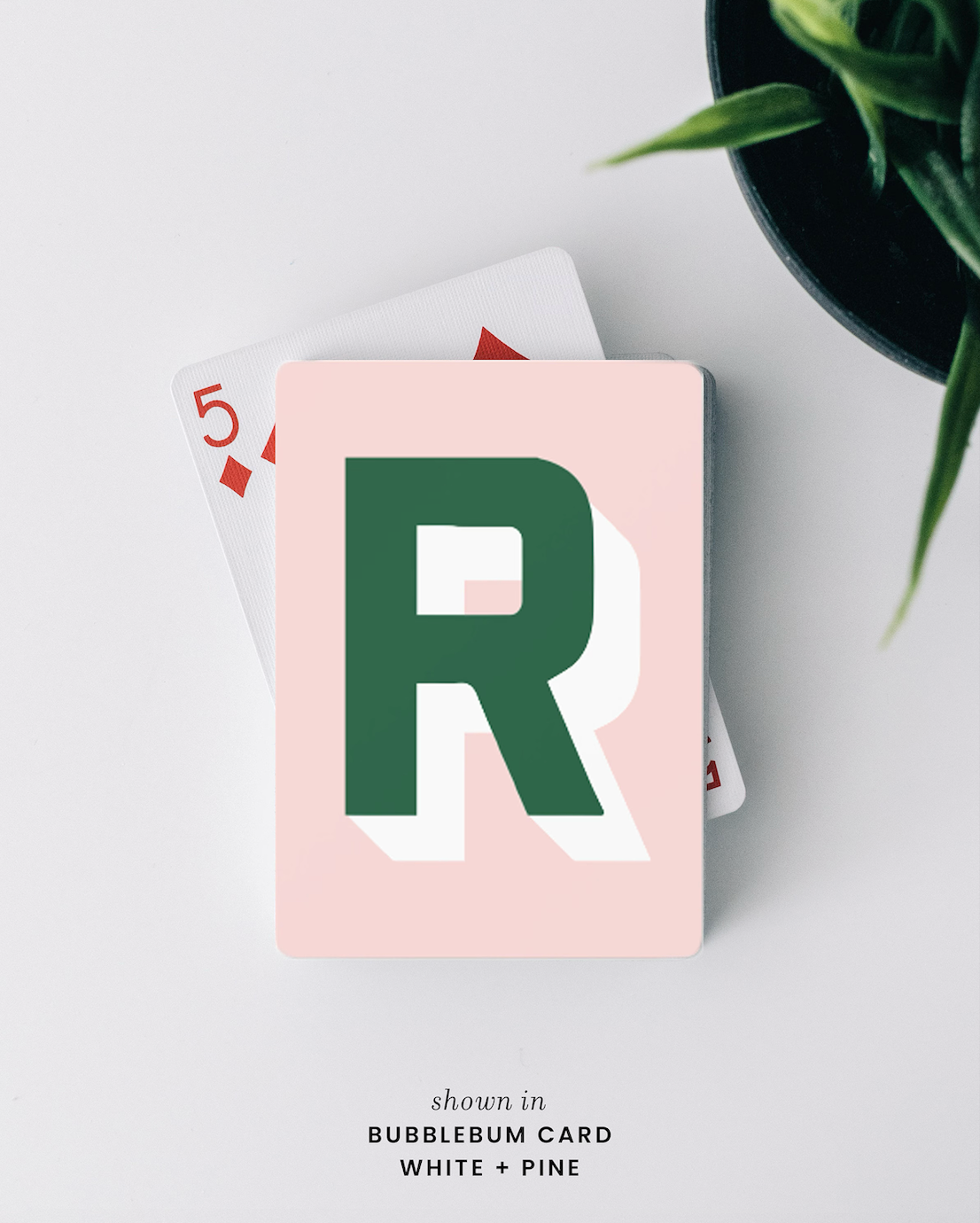 Custom playing card deck with colorful monogram design