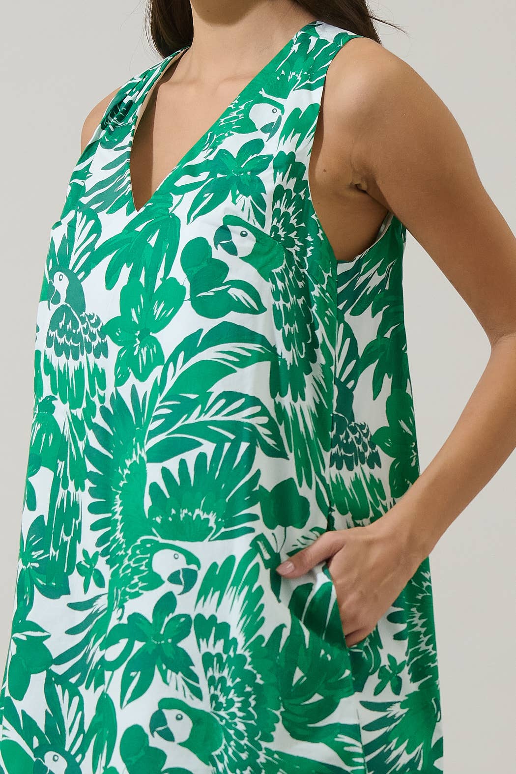 Green and white tropical mini dress with split neckline