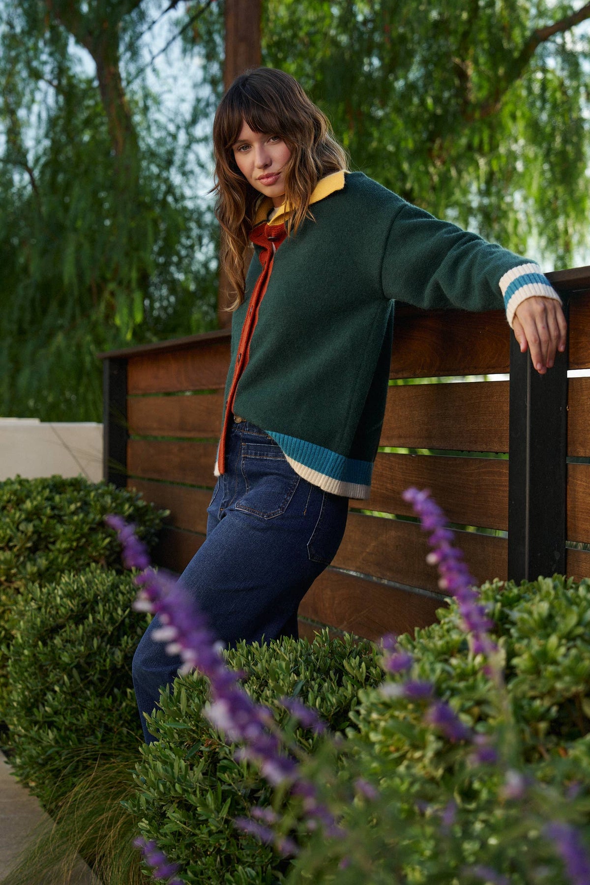 Green colorblock sweater with red teal and yellow accents