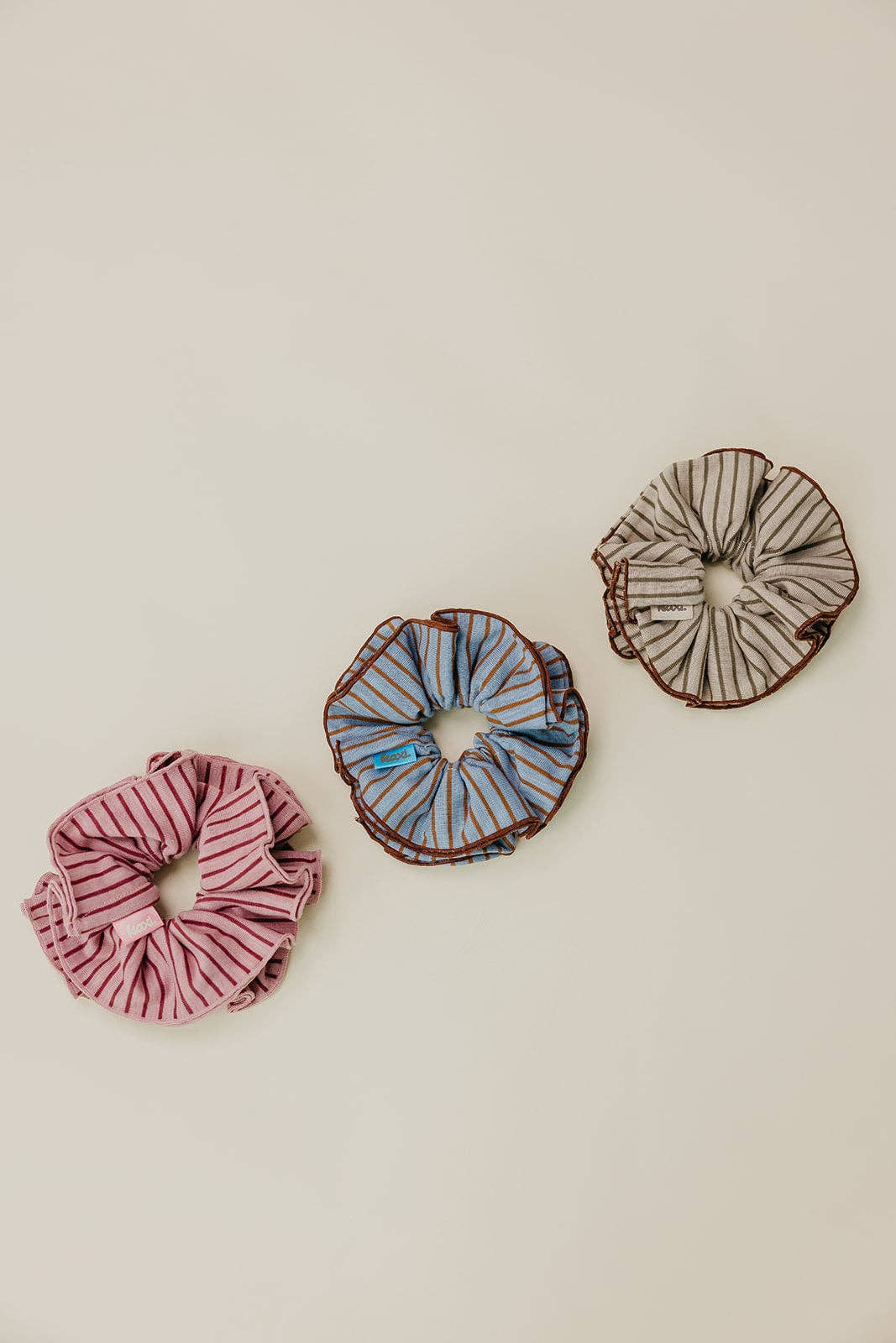 KAXI striped corset scrunchies in three color combinations