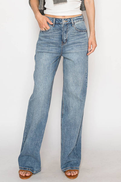 Medium stone wash ultra high rise jeans styled on model