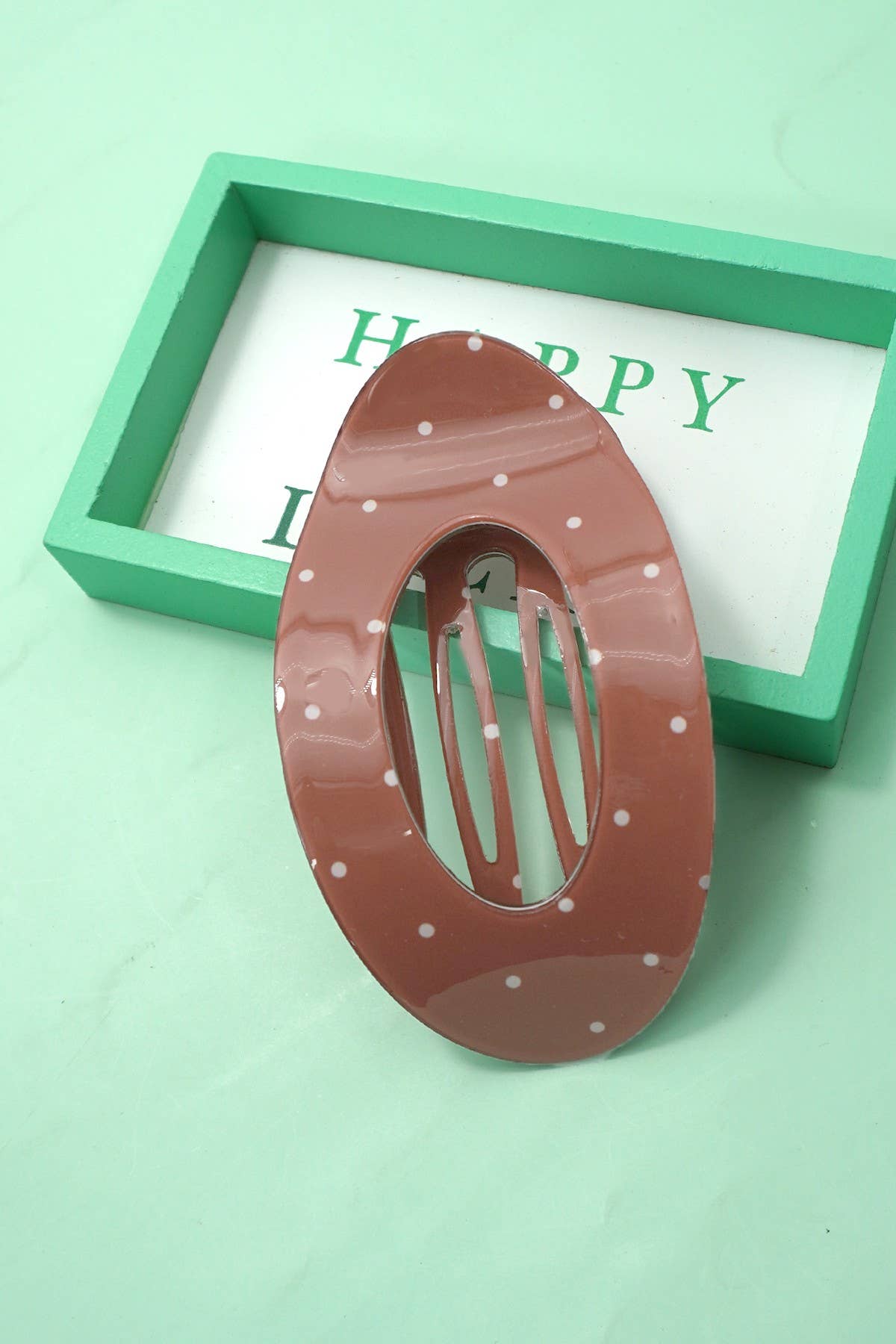 Polka dot flat hair clip with secure grip
