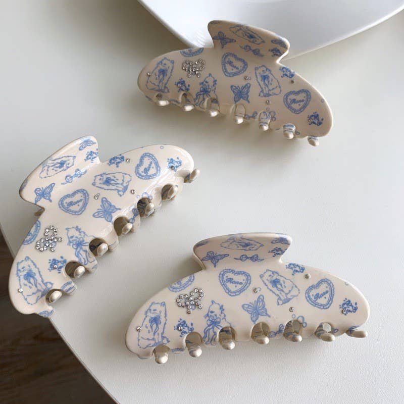 Vintage inspired blue toile hair clip with bow detail