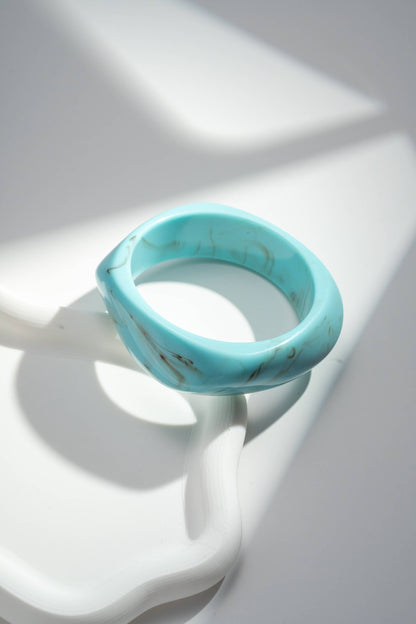 Marble-effect resin bangle bracelet